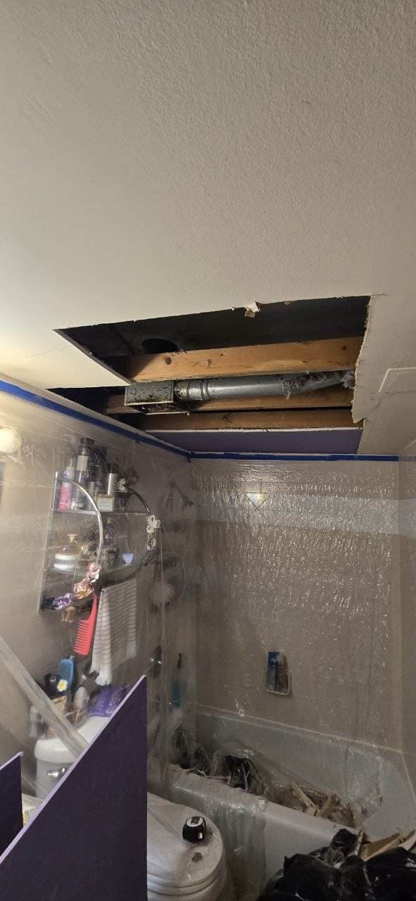 Bathroom ceiling drywall opening repair in Hoffman Estates by BAX Bathroom ceiling drywall opening before repair work by BAX