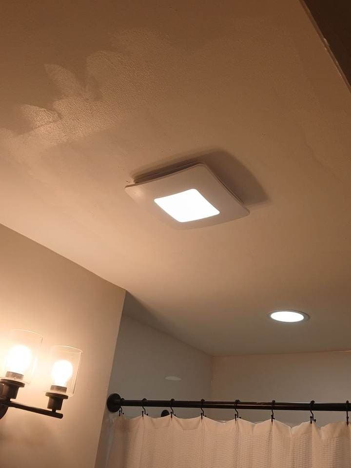 Finished bathroom ceiling drywall repair near Hoffman Estates by BAX Finished bathroom ceiling drywall repair around ceiling fixtures by BAX