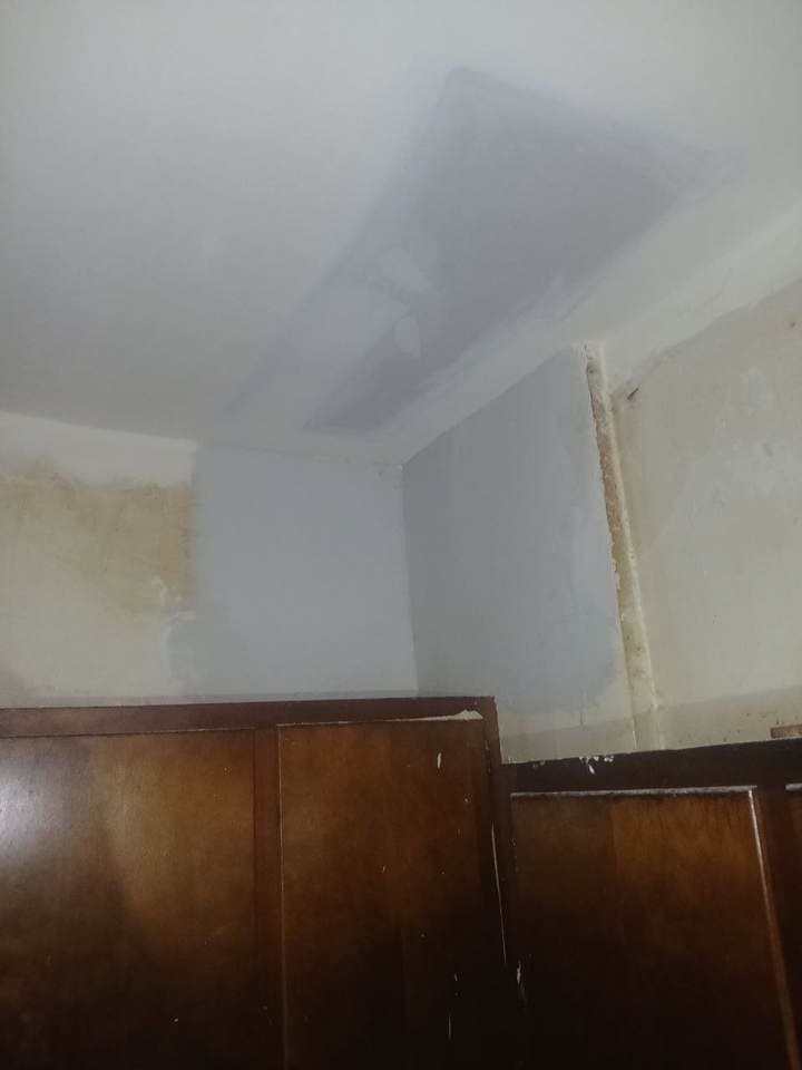 Kitchen corner drywall patch repair in Hoffman Estates by BAX Kitchen corner drywall patch repair above cabinets by BAX