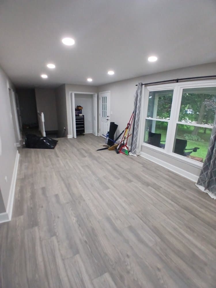 Finished plank flooring installed by BAX in a bright living room